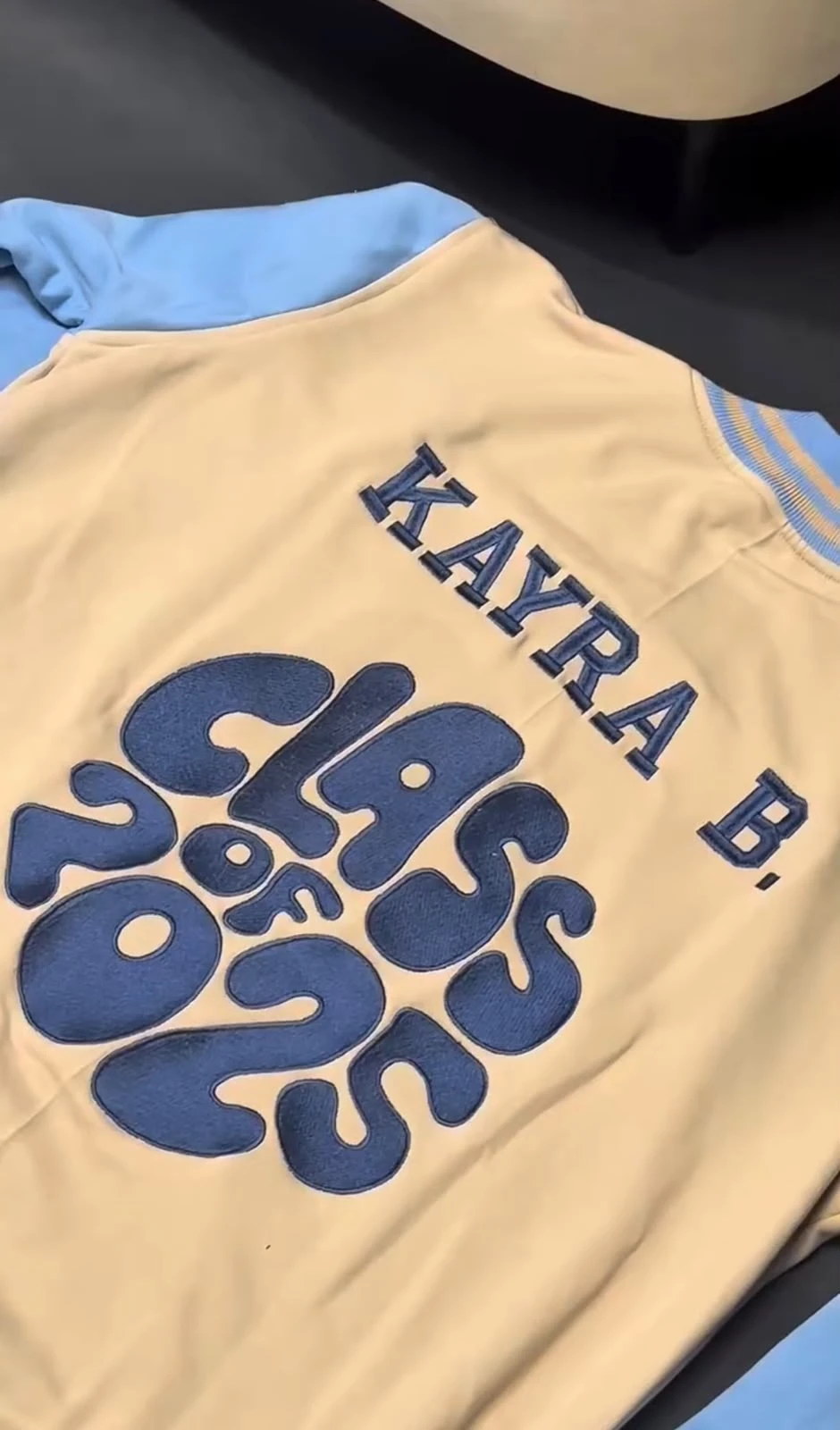Close-up of navy bubble lettering