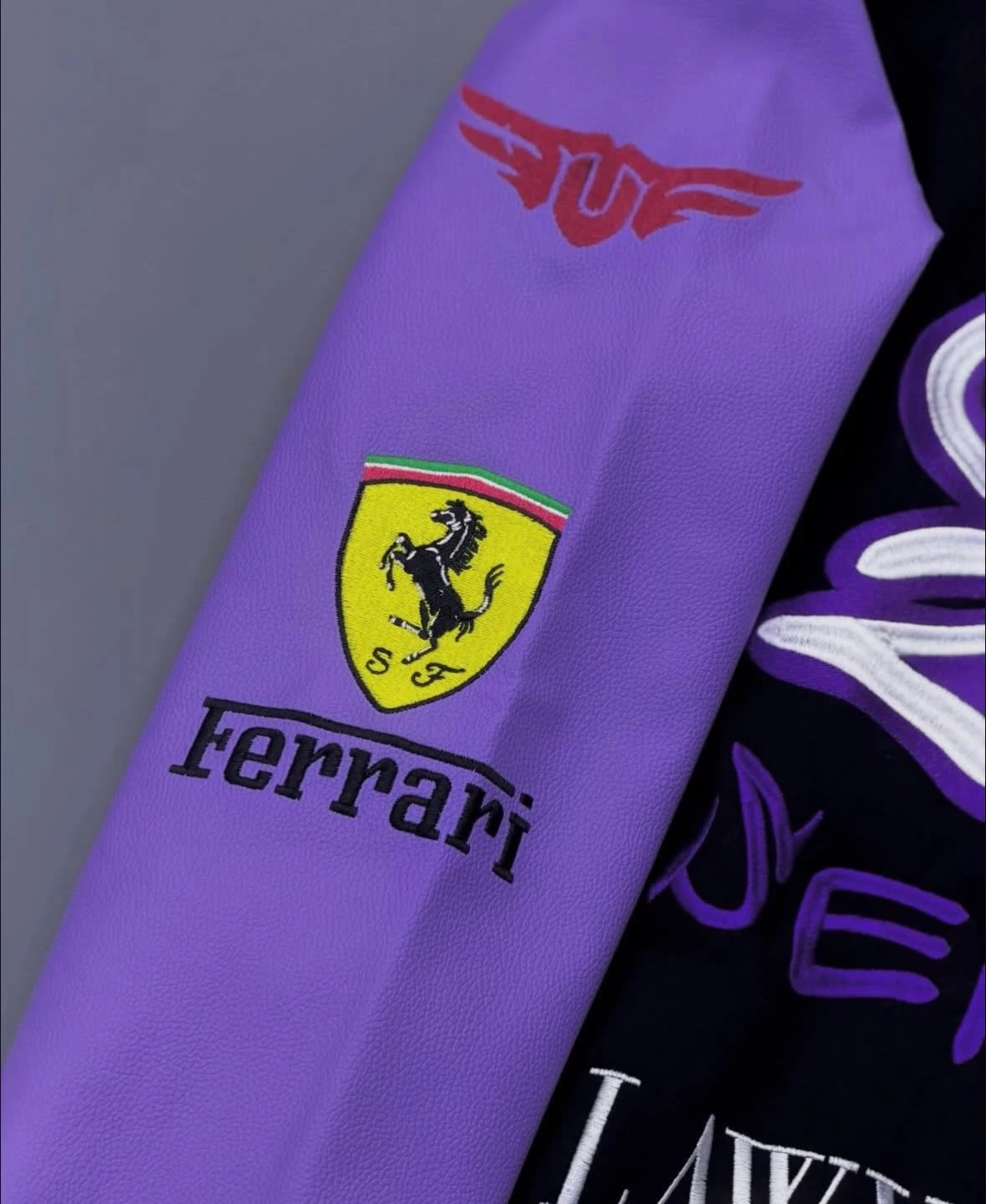 Lilac leather sleeve with a full-color embroidered logo